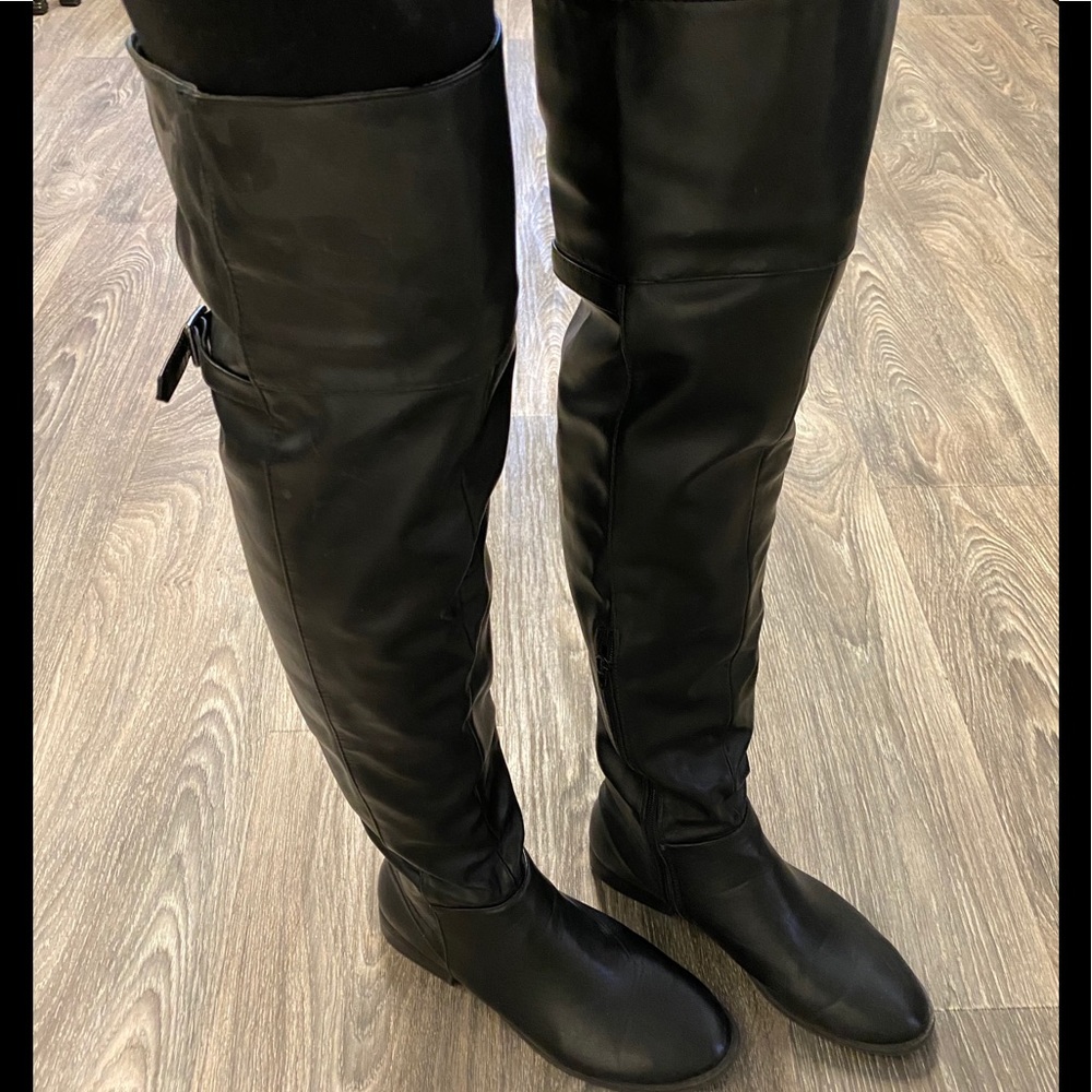 Thigh high/tall black boots/ over the knee